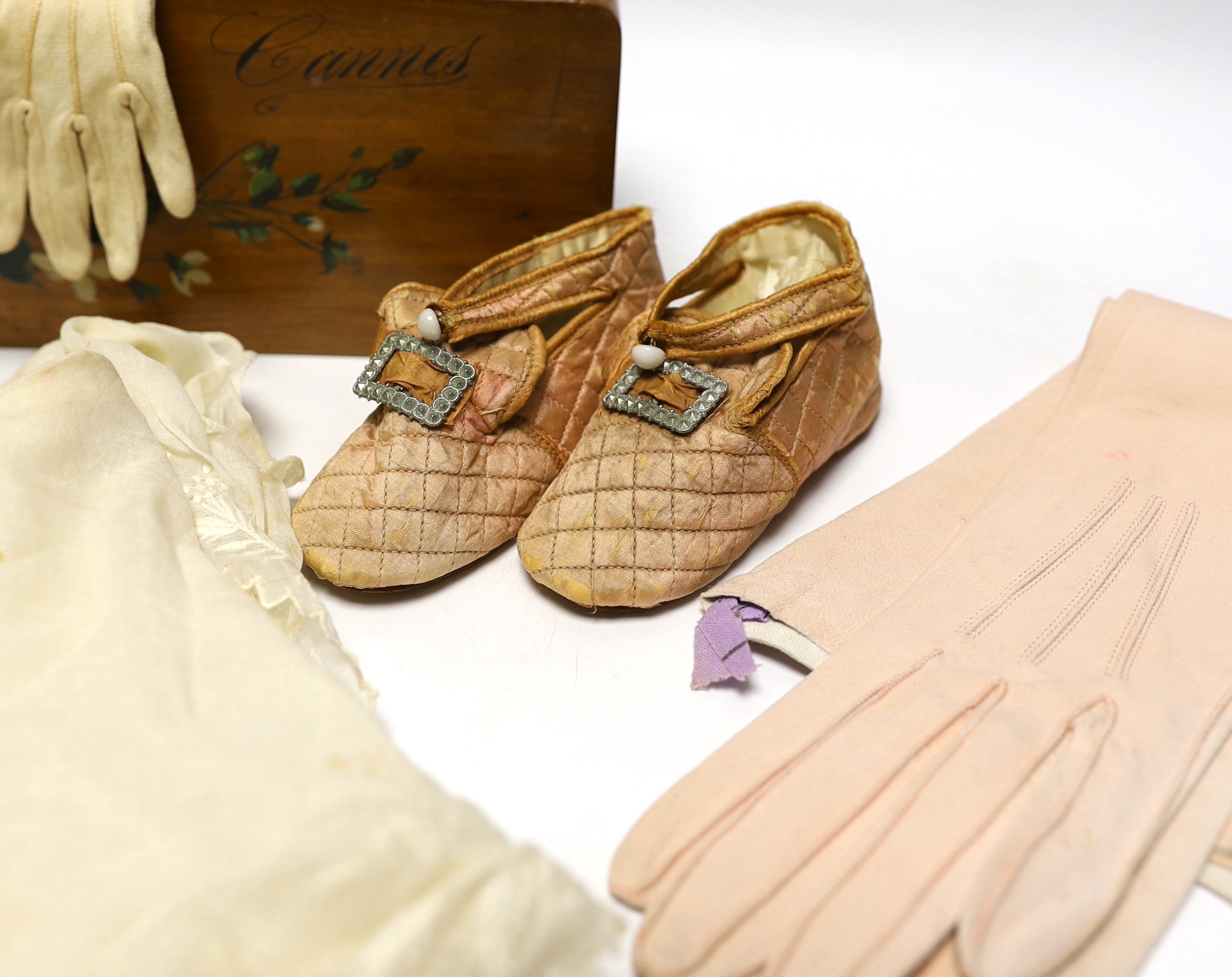 A pair of early 20th century quilted baby shoes, a pair of baby’s gloves, a lady’s pair of pink leather gloves and a collection of fine lawn white worked collars